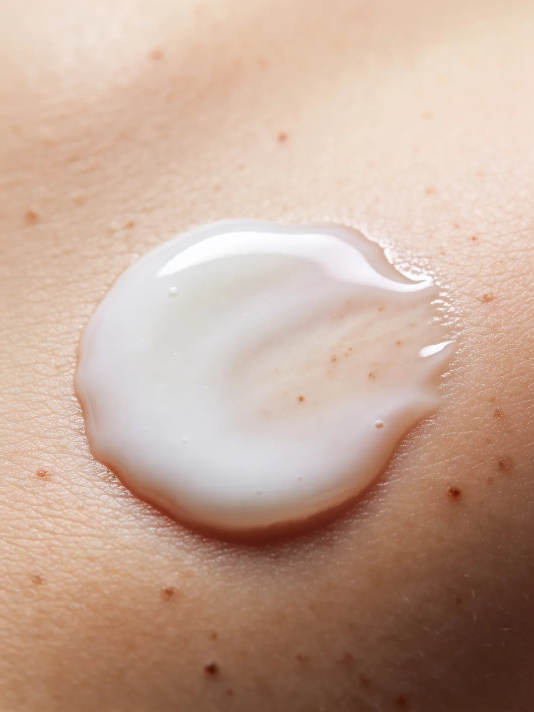 Yelf Clean Affairs Cleansing Milk lightweight texture forming a soft, milky fluid layer on natural skin with visible pores and freckles