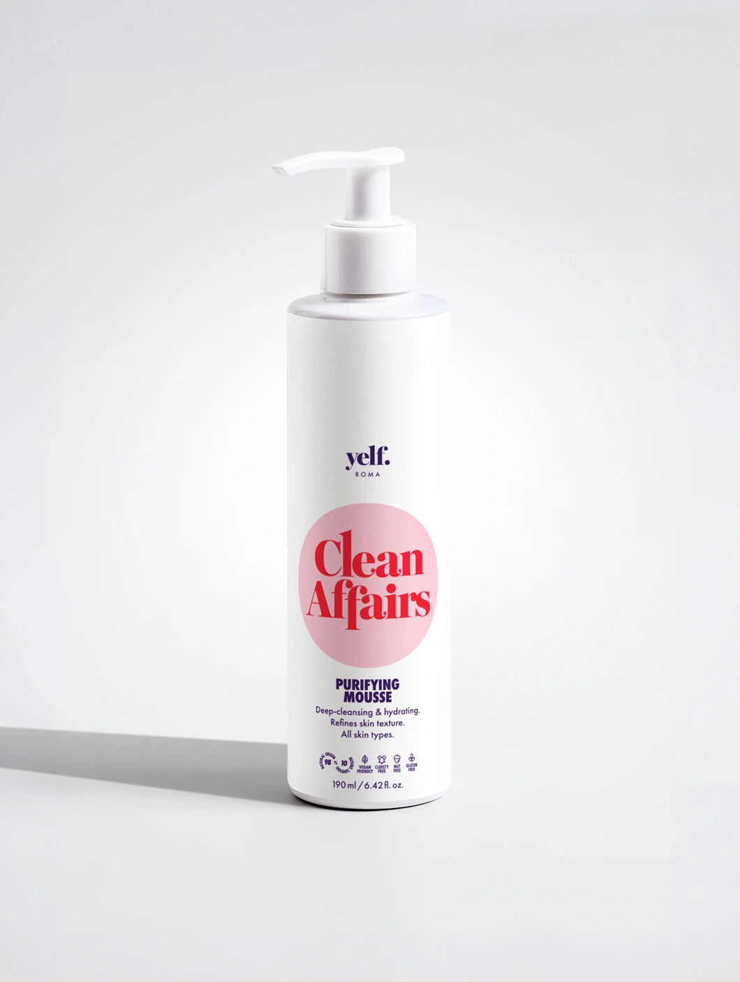 Yelf Clean Affairs Purifying Mousse in a slim pump bottle on a light background with a natural shadow