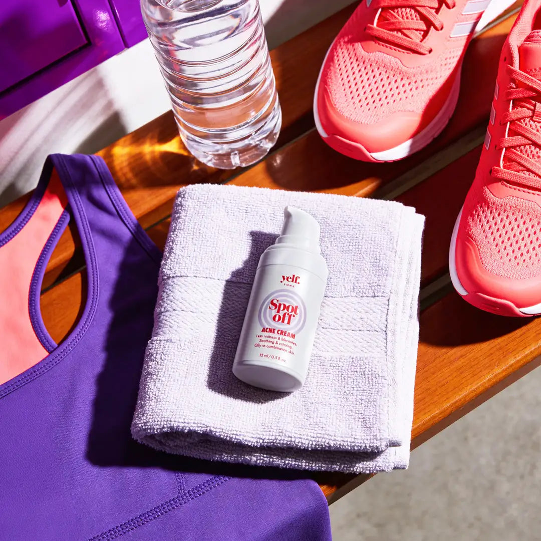 Yelf Spot Off Acne Cream as part of an active gym routine with towel, water bottle and sportswear in a modern high-contrast lifestyle scene