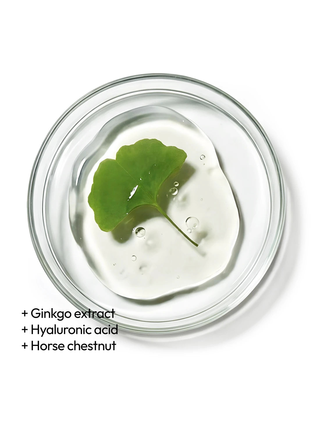 Top view of ginkgo extract, hyaluronic acid and horse chestnut in a fresh gel texture in a petri dish, illustrating revitalising and de-puffing ingredients used in Yelf Spot Off Brightening Eye Cream