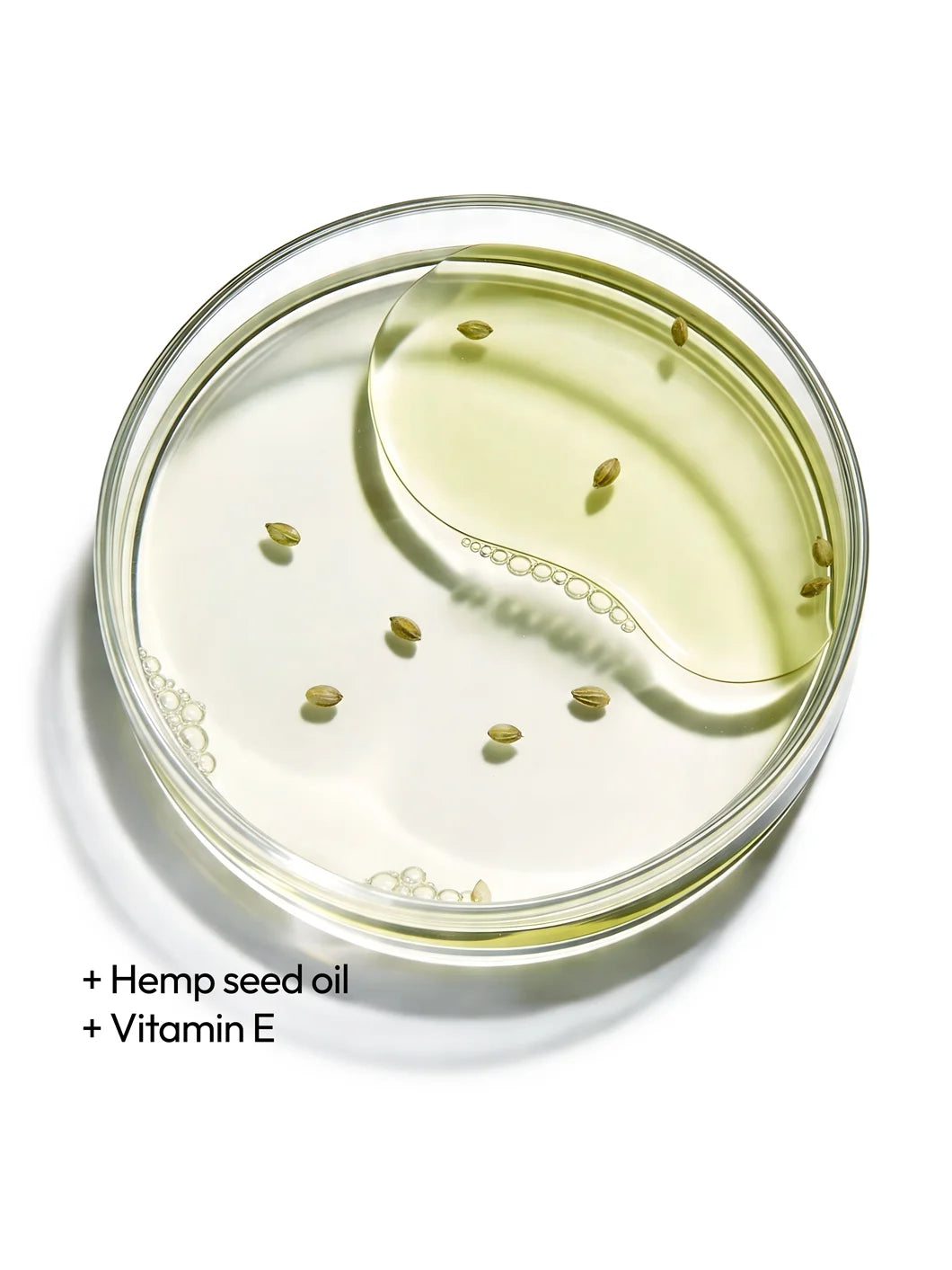 Top view of hemp seed oil and vitamin E in a light oil texture, illustrating nourishing and antioxidant support in Yelf Viva el Boost Cannabidiol Oil