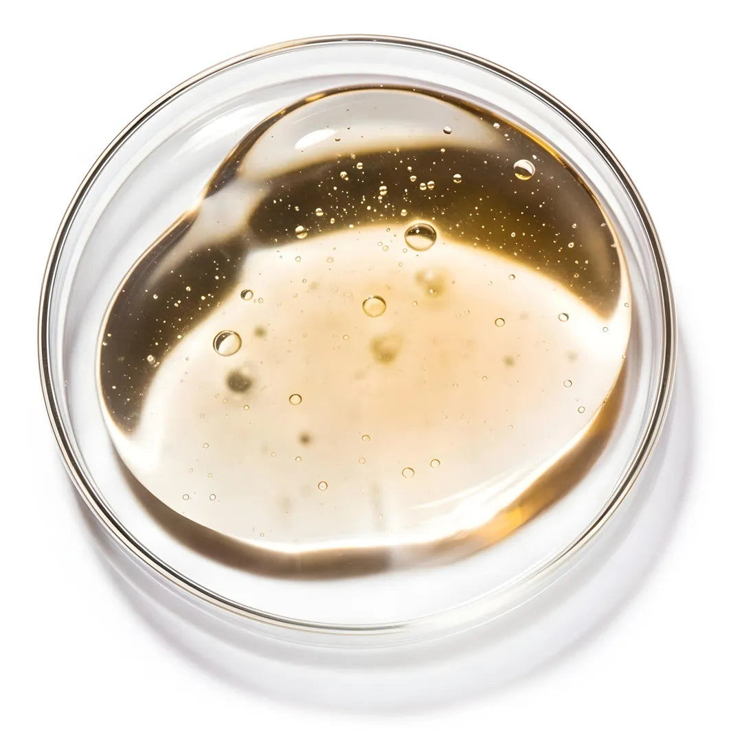 Yelf Viva el Boost Hyaluron Cream shown as a glossy hyaluronic acid gel with micro bubbles in a petri dish, bright studio lighting, minimal skincare aesthetic.